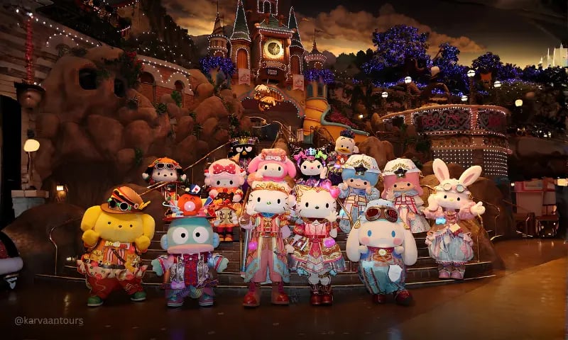 Sanrio characters parade performance at Wisdom Tree stage inside Puroland Tokyo at night