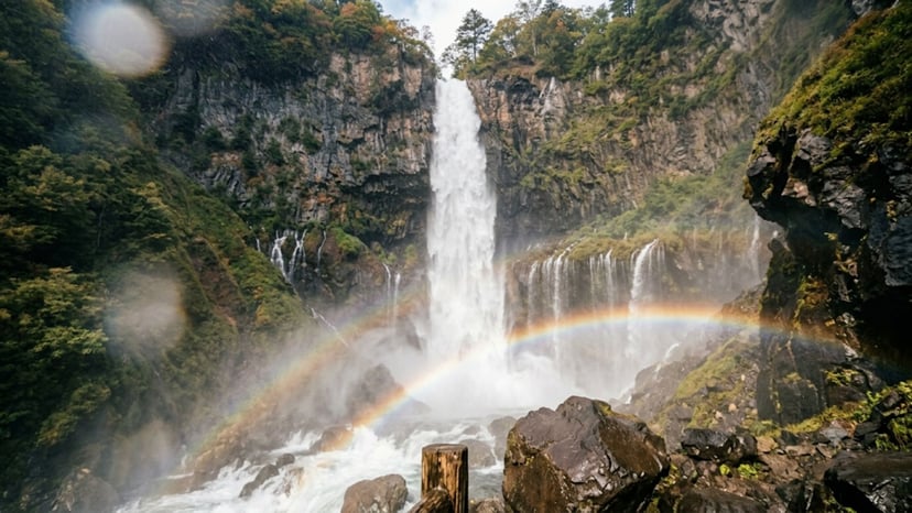 Close-up view of the powerful base of Kegon Waterfall with rising mist and crashing water.