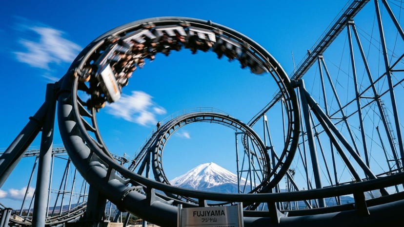 The FUJIYAMA roller coaster with Mount Fuji in the background.
