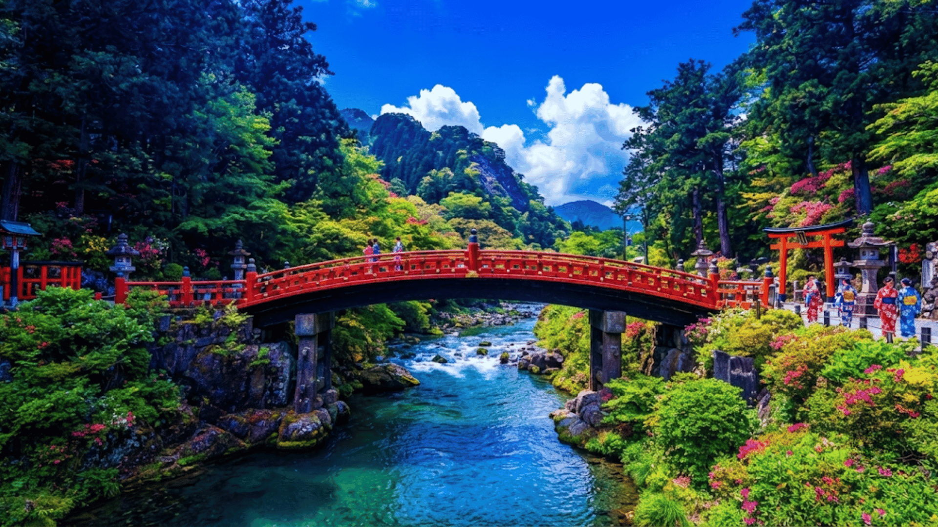 Iconic red Shinkyo Bridge spanning a clear, rushing river in the lush Nikko forest.