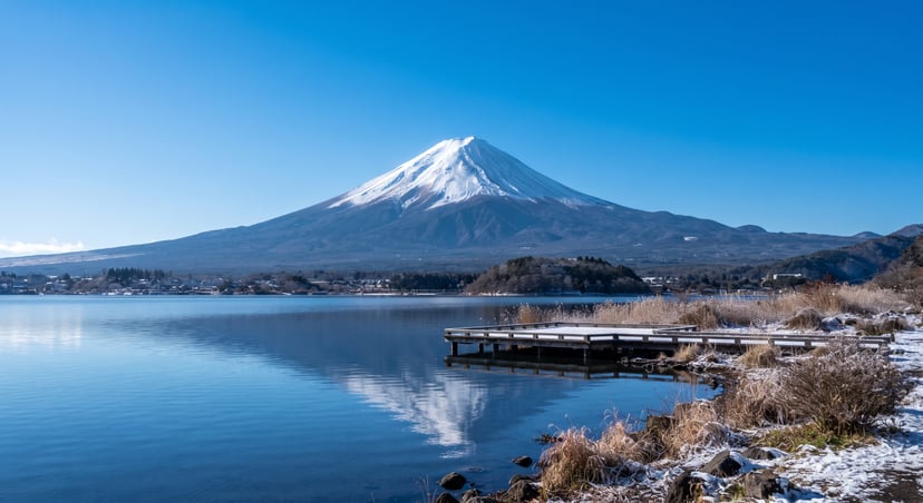 Snow-capped Mount Fuji and blue sky view from Oishi Park in winter