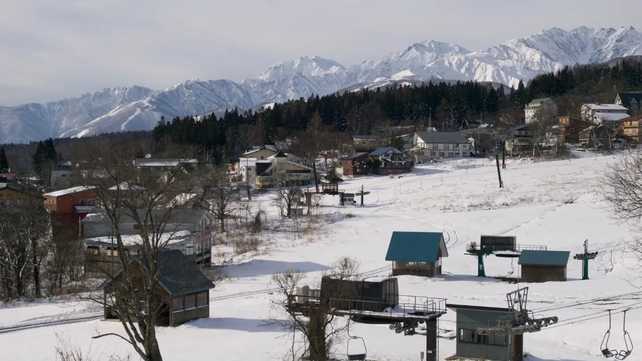 snow covered village houses during winter